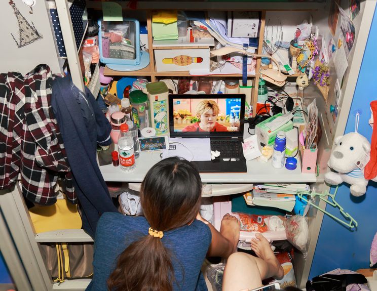 Chinese dorm room desk packed with things, College dorms in China